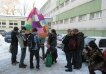 Group of students with their teacher preparing the flight of a hot-air balloon