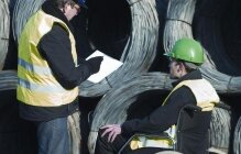 Two people on a working ground