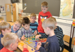 Group of pupils playing a game - imagen decorativa